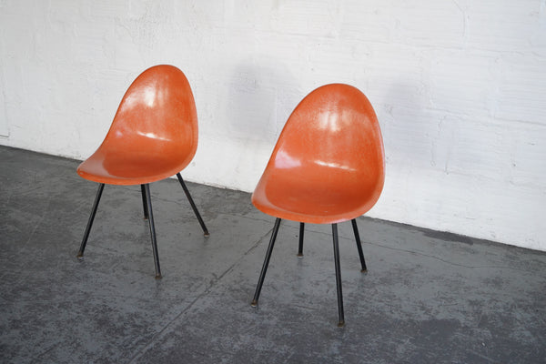 Orange Fiberglass Shell Chairs