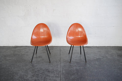 Orange Fiberglass Shell Chairs