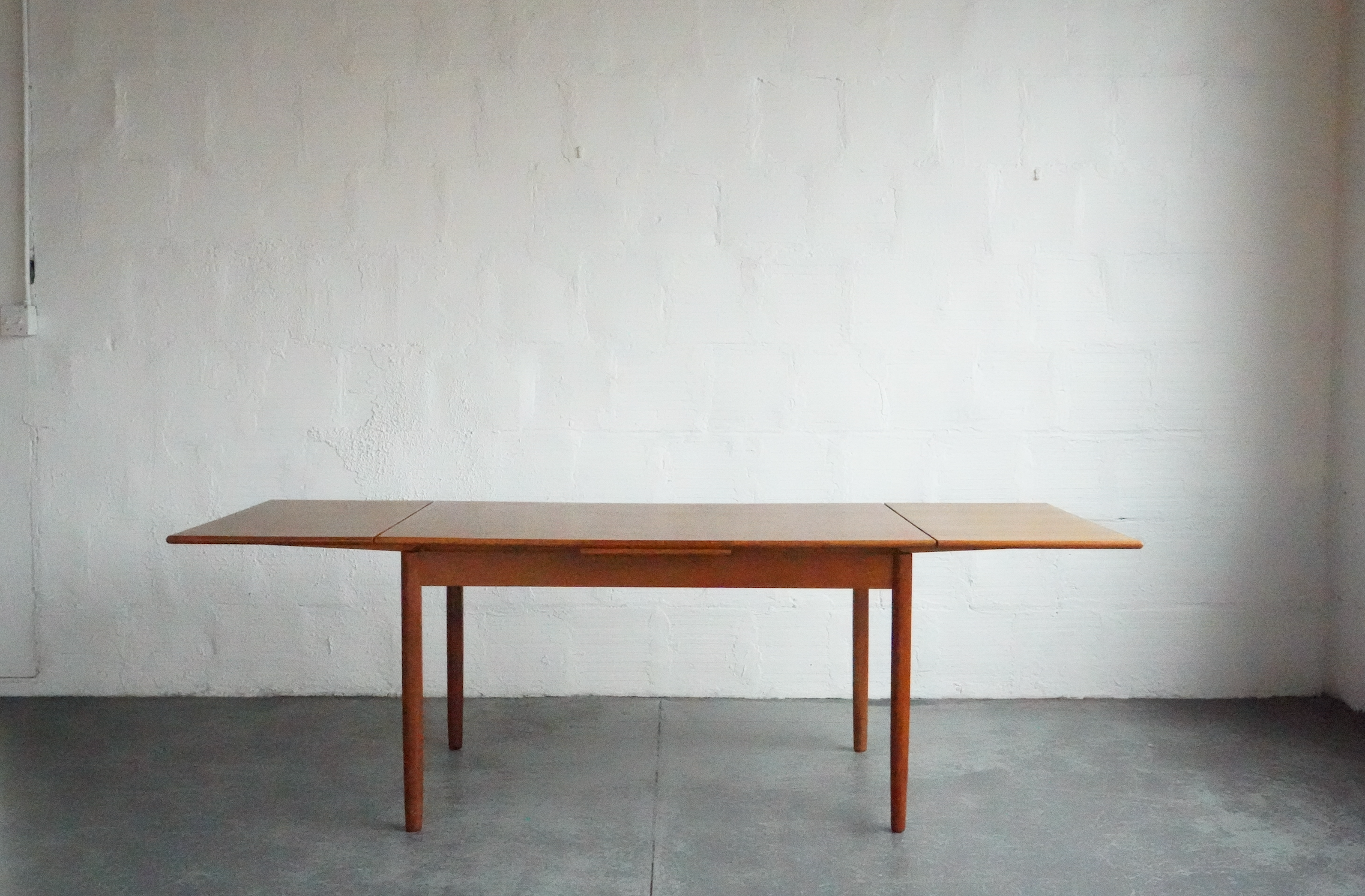 Danish teak extendable dining table discount