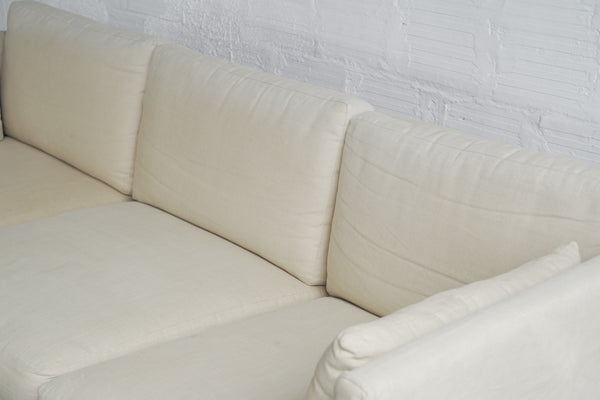 Cream Three-Seater Sofa